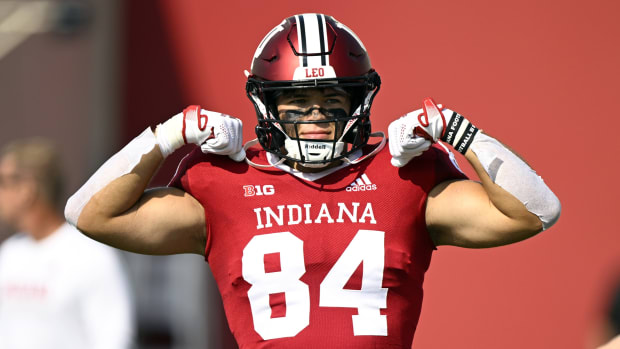 Indiana Hoosiers tight end Aaron Steinfeldt (84) flexes for the crowd during warm ups before the game against the Western Kentucky Hilltoppers at Memorial Stadium.